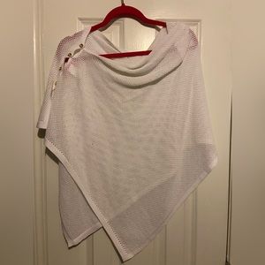 White Shaw that has maybe been worn once over a dress.